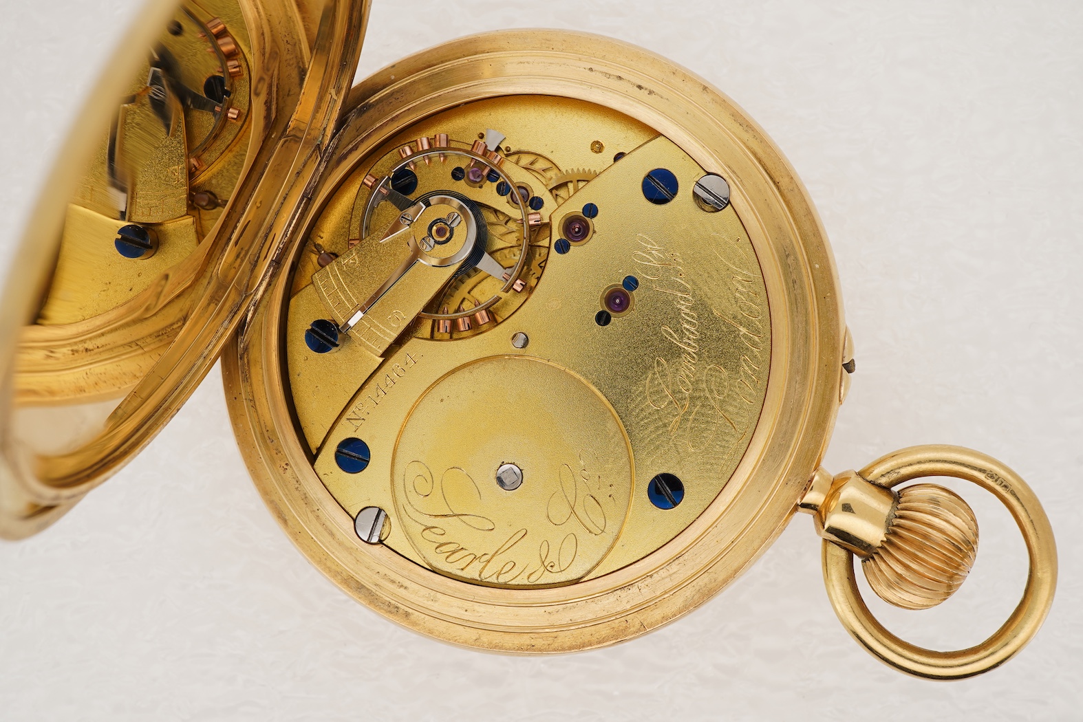 An Edwardian 18ct gold half hunter keyless lever pocket watch, by Searle & Co, Lombard Street, London
